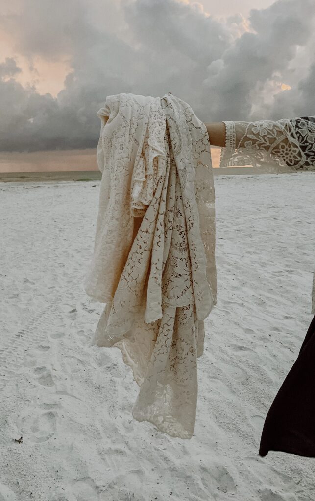 lace tablecloth on beach